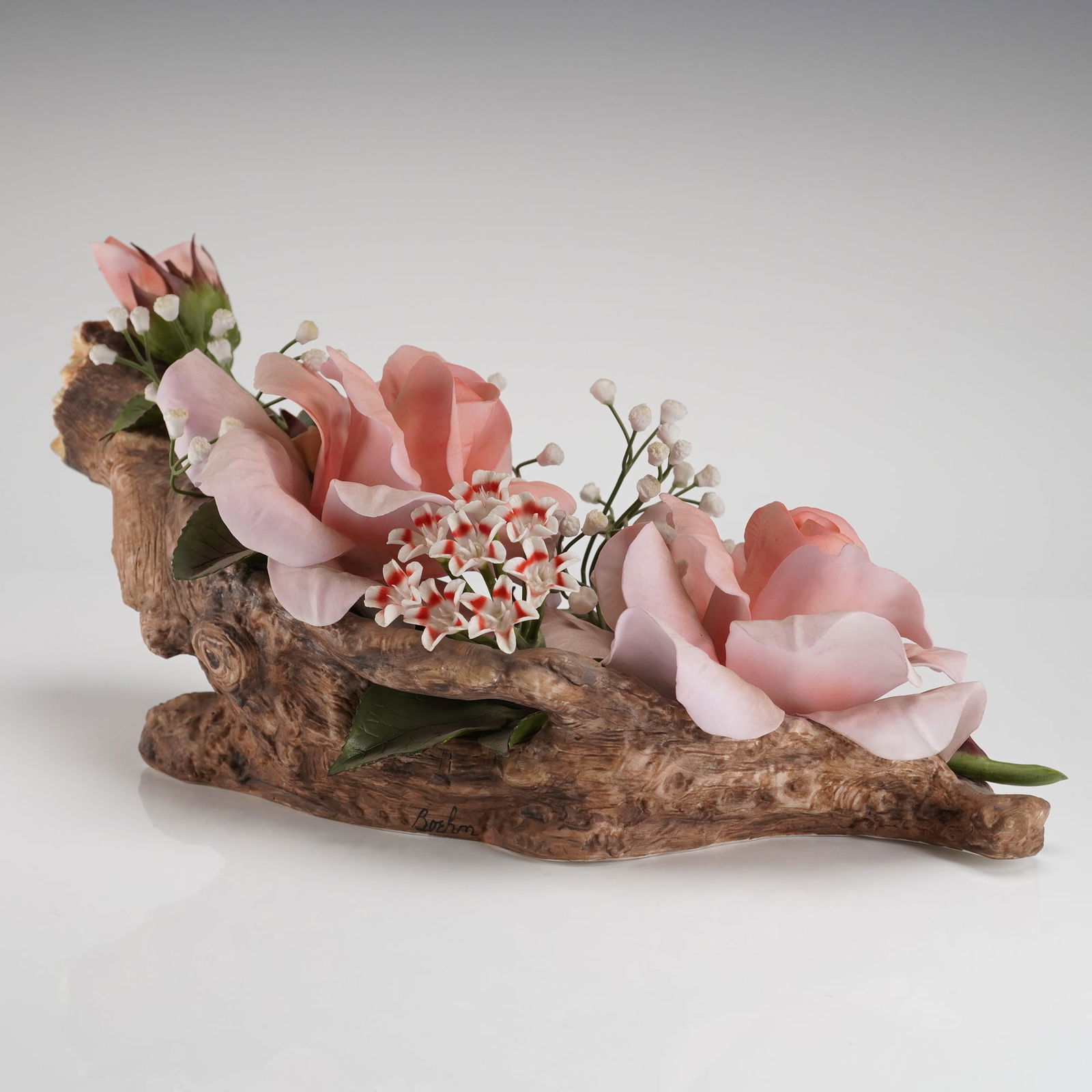 Boehm Porcelain Figurine - Royal Blessing, Birth of Prince William 1982: This is a single bone porcelain floral figurine from the Boehm "Royal Blessing" series, dated 1982. The sculpture depicts a naturalistic arrangement of several open pink roses, accompanying buds, smal