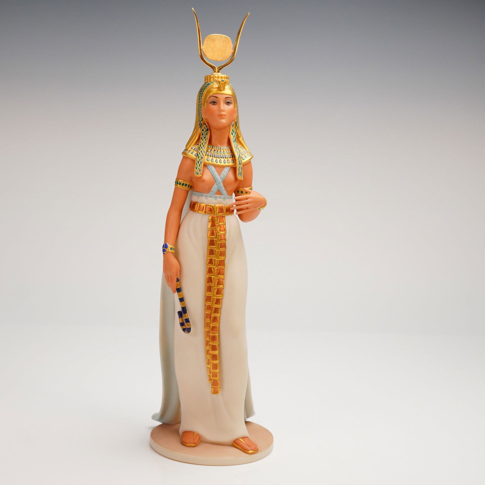 Goebel Crafts NA Egyptian Goddess Sculpture, Laszlo Ispanky Ltd Ed.: A limited edition Goebel Crafts of North America Egyptian sculpture, designed by Laszlo Ispanky. The standing figurine, executed in polychrome ceramic or porcelain, depicts an Ancient Egyptian goddess