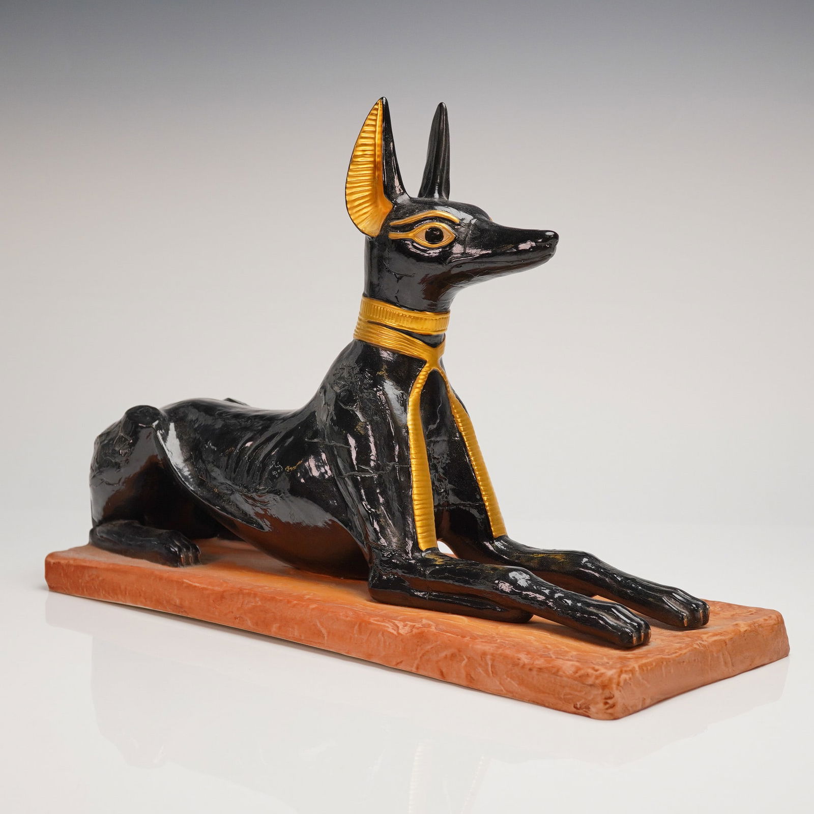 Boehm Egyptian Salutes God Anubis Porcelain Figurine: A limited edition Boehm porcelain figurine, titled "God Anubis" from the "Egyptian Salutes" series. This figurine was produced by Edward Marshall Boehm, U.S.A., to commemorate The Treasures of Tutankh