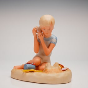 A Cybis Bisque Porcelain Figurine Child Listening to Conch Shell