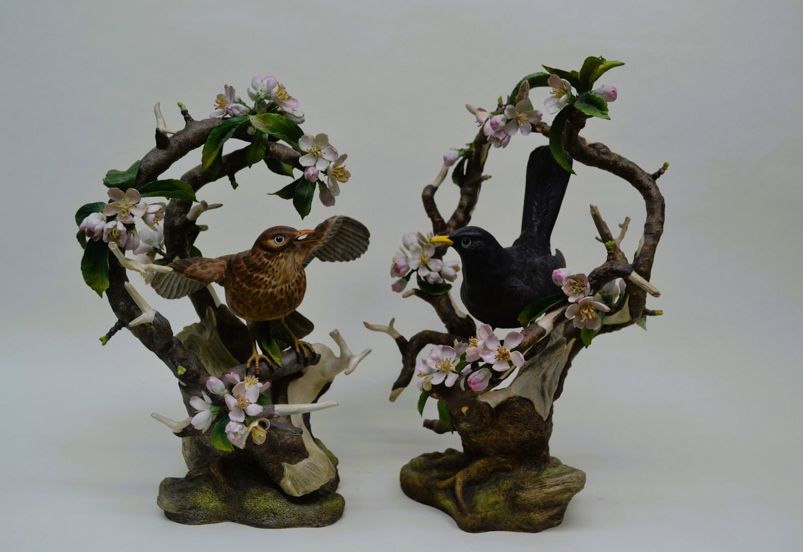 Boehm Porcelain Black Birds W/Cherry Blossoms, Pair, 1973: Fine Bone China, Decorated, hand created, hand painted by the Artists of the Boehm Studio in Malvern, England, UK. Hallmark: 100-13. Introduced in 1973, a sold out Limited Edition of only 75 pair sinc