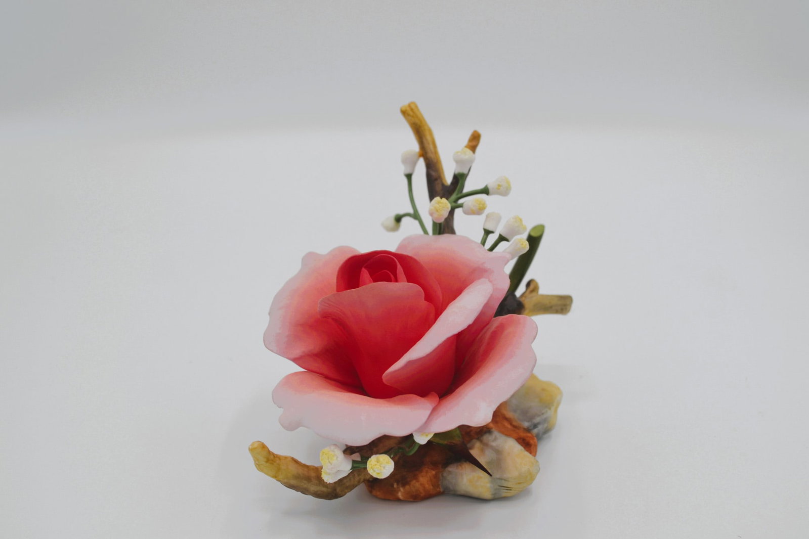 Boehm Porcelain Royal Blessings Rose With Baby's Breath Floral, 1983: Bisque Porcelain Decorated, hand created, hand painted by the Boehm Studio Artists in Trenton, New Jersey, USA. Featuring the Royal Blessings Rose with Baby's Breath. A beautiful floral of the Rose in