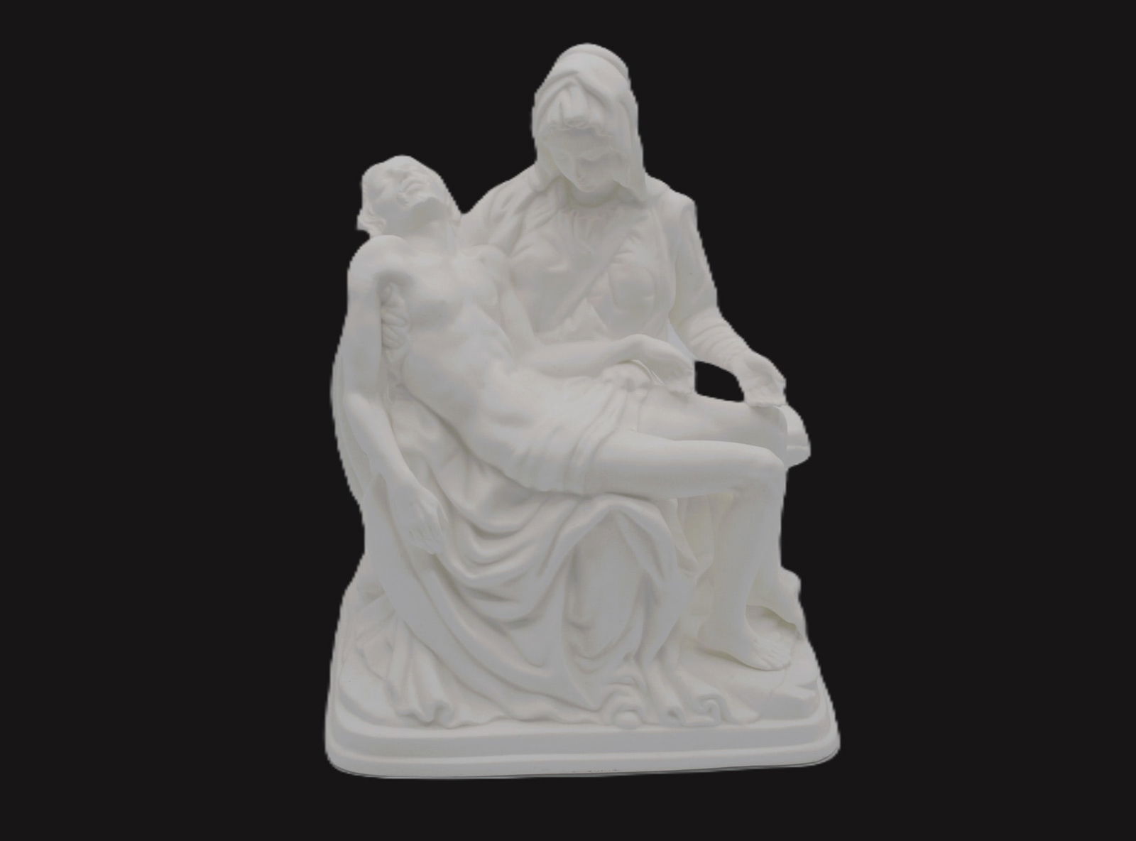 Lenox Porcelain Pieta Sculpture, LE, 1993: Lenox Porcelain presents the White Pieta Sculpture, hand created in Fine Bone China, introduced in 1993. This Sculpture features Michelangelo's iconic depiction of the Virgin Mary and Jesus Christ, ti