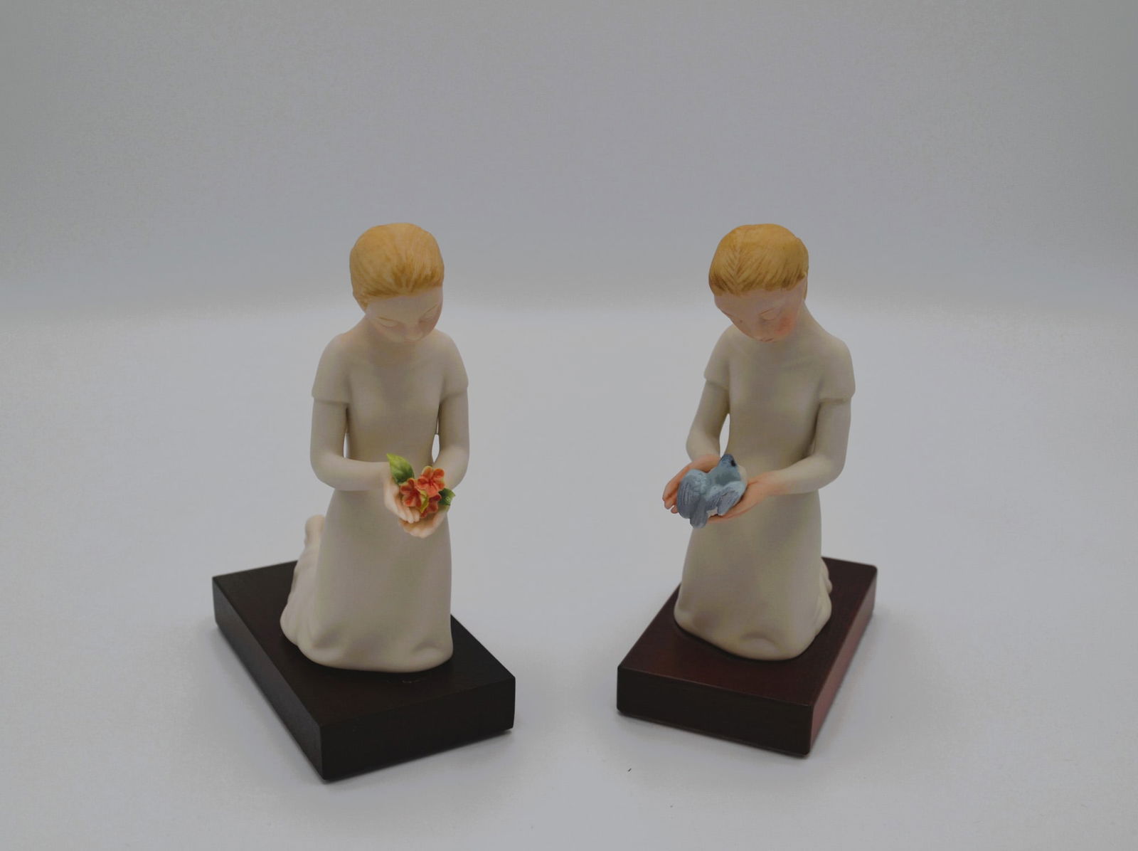 2Pc Cybis Porcelain First Flight Sculptures, 1966: Bisque Porcelain Decorated, hand created, hand painted by the Artisans of the Cybis Studio in Trenton, NJ, USA. Featuring two (2) different models of "FIrst Flight" from the Children to Cherish Collec