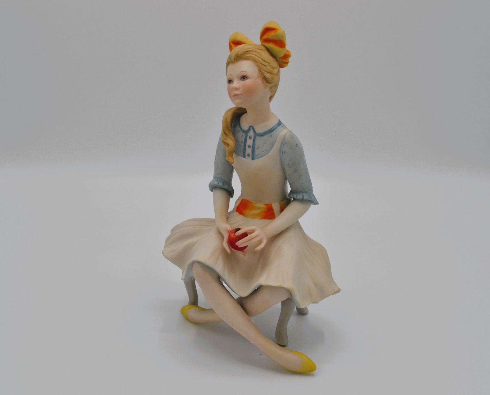 Cybis Porcelain Polly Anna Sculpture, 1971: Bisque Porcelain Decorated, hand created, hand painted by the Artisans of the Cybis Studio in Trenton, NJ, USA. Featuring the Sculpture of "Polly Anna" from the Children to Cherish Collection. Hallmar