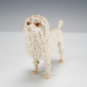 A Wedgwood Off-White Porcelain Poodle Figurine by Ernest Light