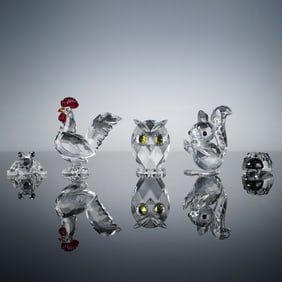 A Collection of Five Swarovski Miniature Crystal Animal Figurines