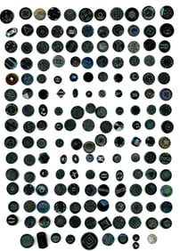 A card of old black glass buttons