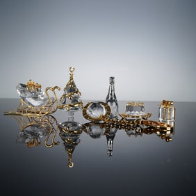 A Collection of Six Swarovski Crystal Memories Mini Figurines and Charms