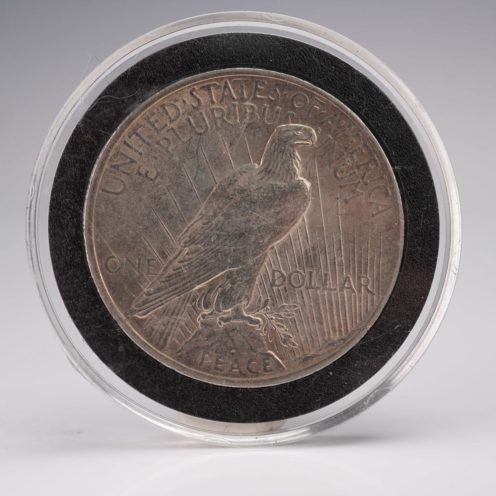 1922 (P) Liberty Silver Peace Dollar: United States, 1922. Silver Peace Dollar, struck at the Philadelphia Mint, designed by Anthony de Francisci. The obverse features the head of Lady Liberty facing left, adorned with a radiant crown, wi