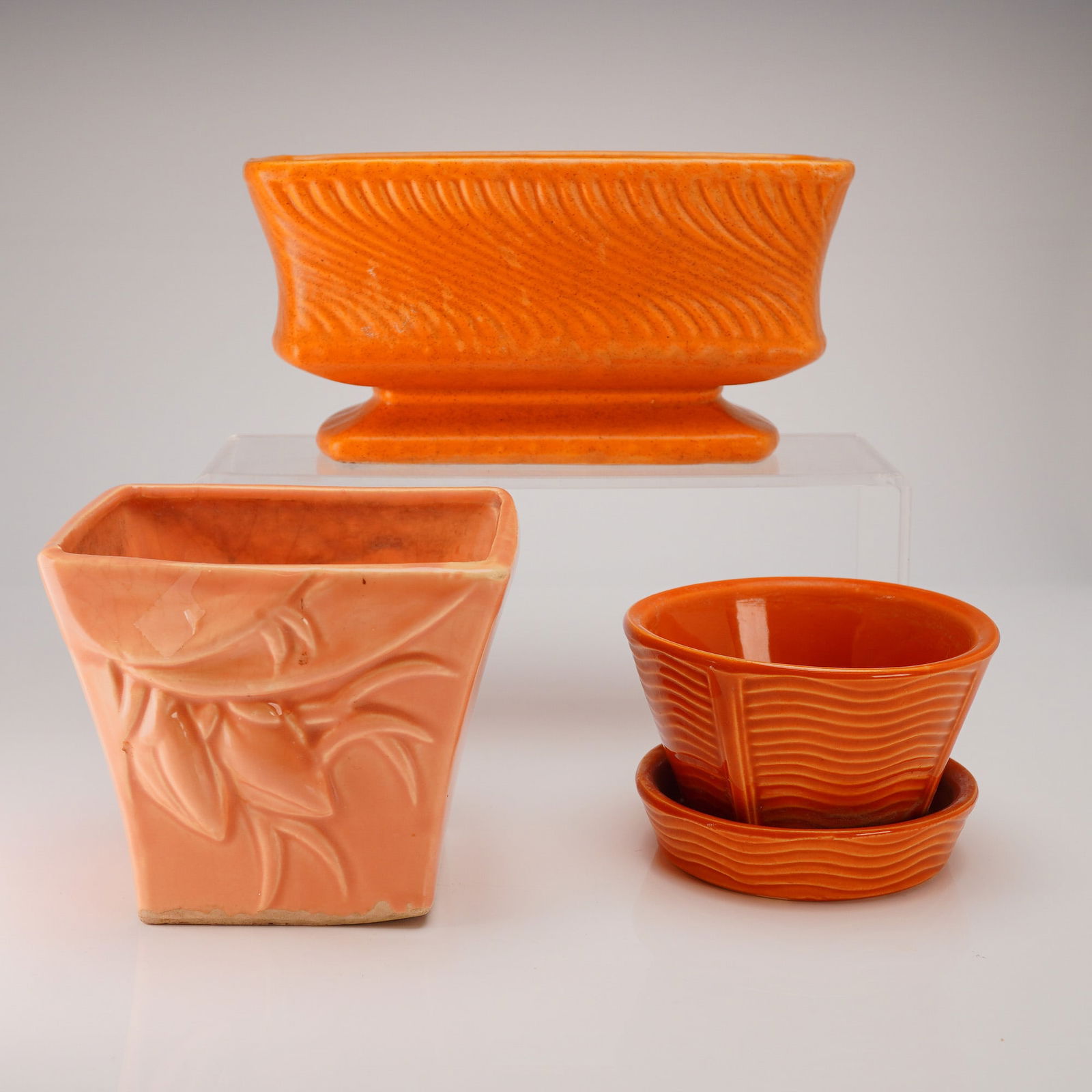 A Collection of Four Pieces of McCoy Art Pottery Planters and Saucer (1 of 3)