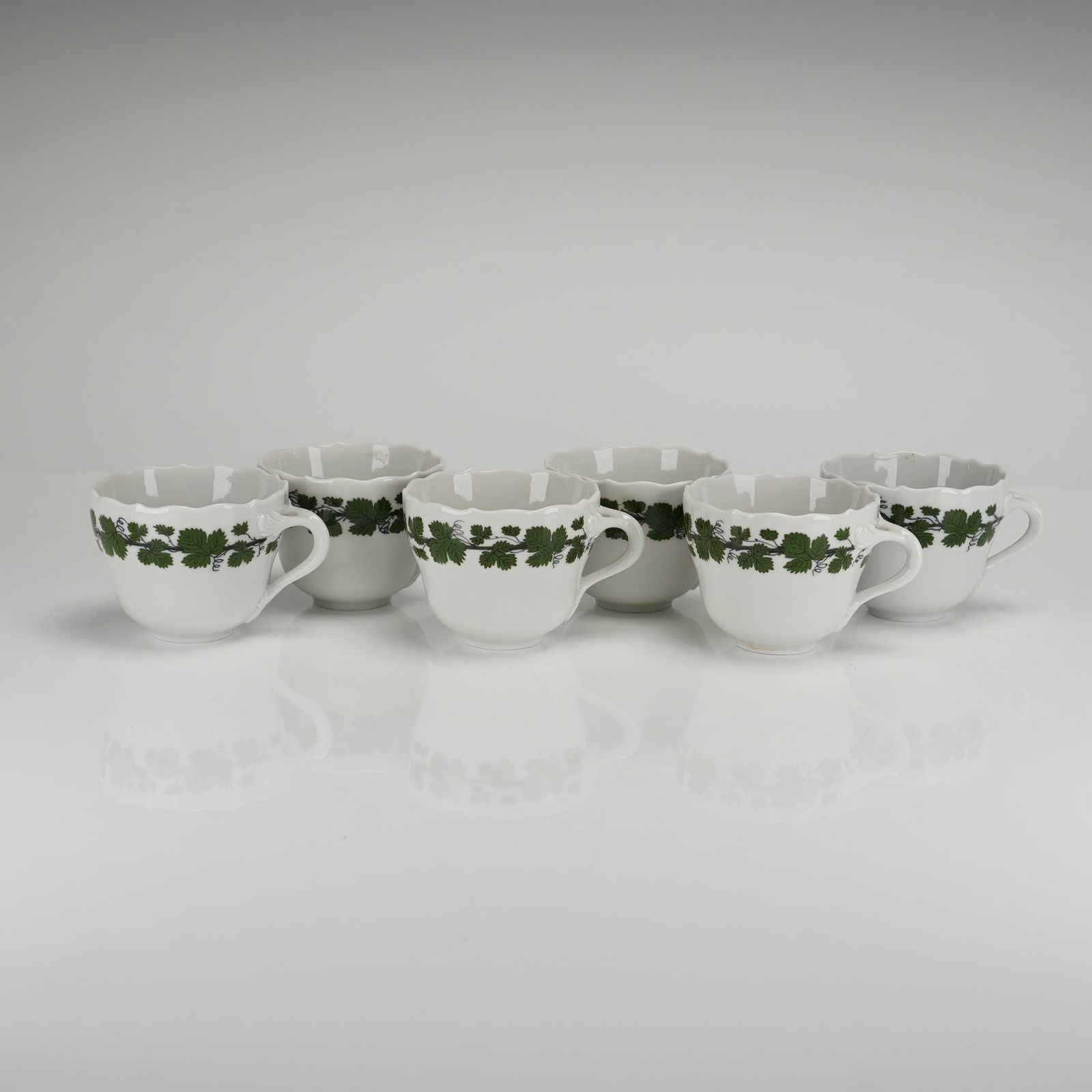 A Collection of Six Meissen Porcelain Vine Leaf Pattern Mocha Cups (1 of 4)