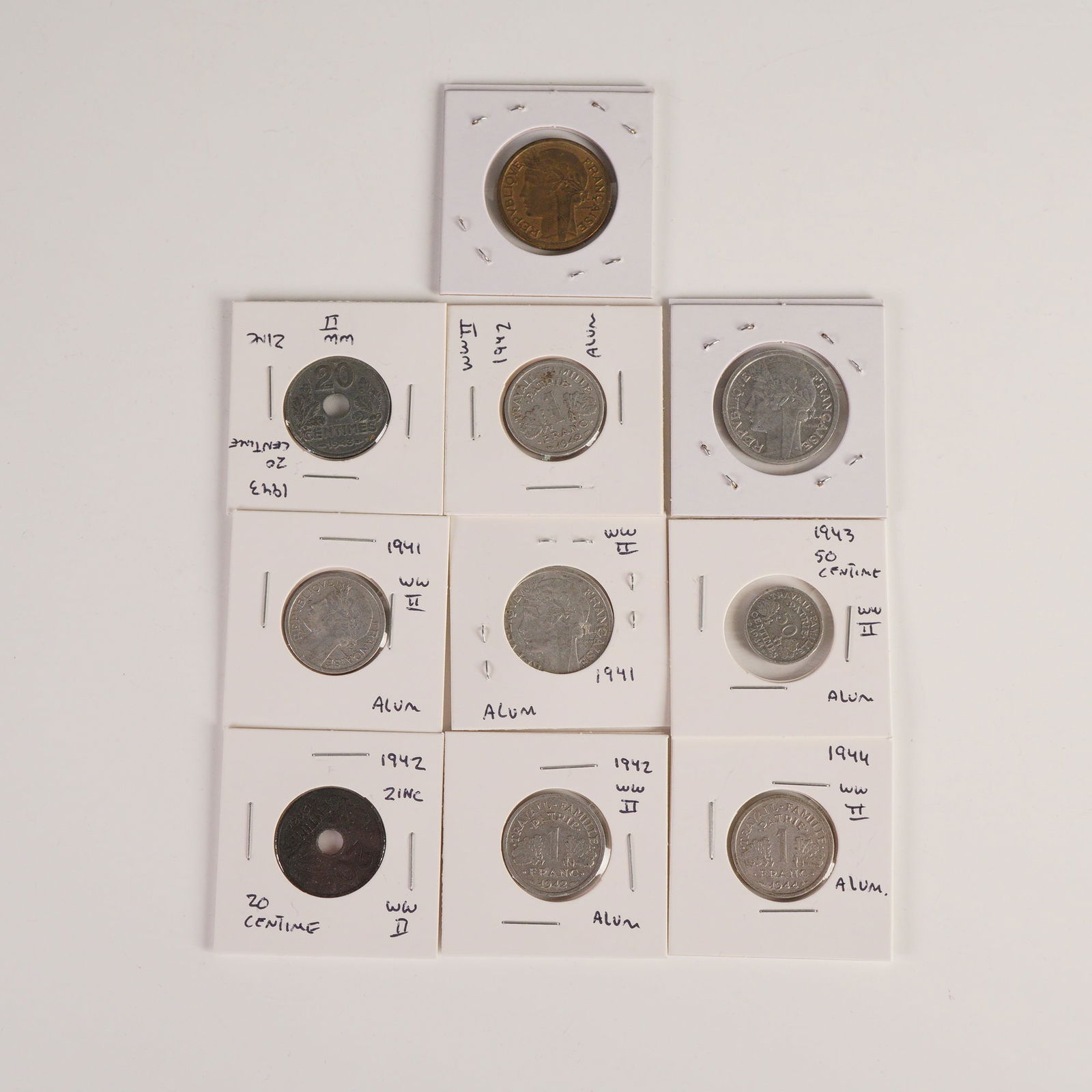 10pc French 1941 to 1945 Francs & Centimes Coins: Including 2 Francs pieces in bronze and aluminum featuring the obverse bust of Marianne with REPUBLIQUE FRANCAISE and reverses inscribed LIBERTE EGALITE FRATERNITE above the denomination; aluminum 1 F