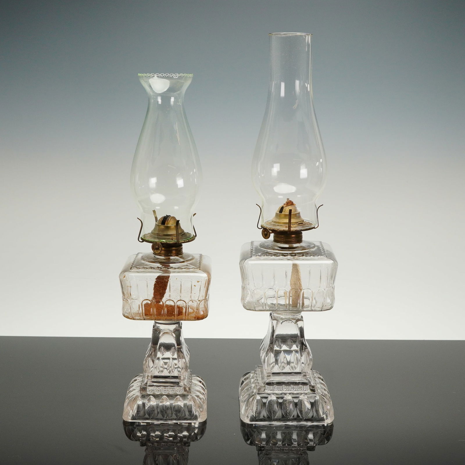 A Pair of Victorian Pressed Clear Glass Oil Lamps with Chimneys (1 of 4)