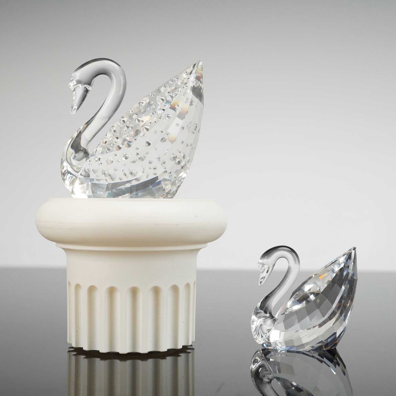 A Pair of Swarovski Crystal Centenary Swan Figurines with Stand (1 of 4)