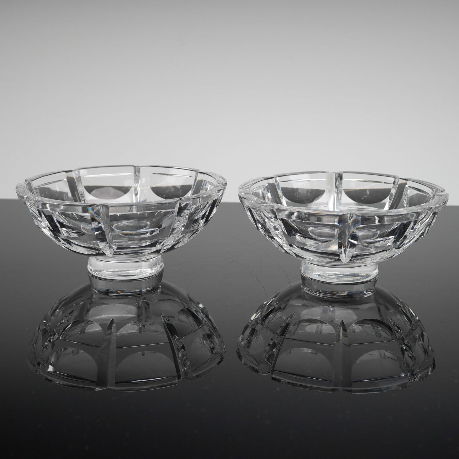 A Pair of Orrefors Simon Gate Thousand Windows Crystal Bowls: A 5pc grouping of pressed glass figural containers, typically utilized as novelty toothpick holders or small candy dishes, dating to the late 19th or early 20th century. The collection includes five d