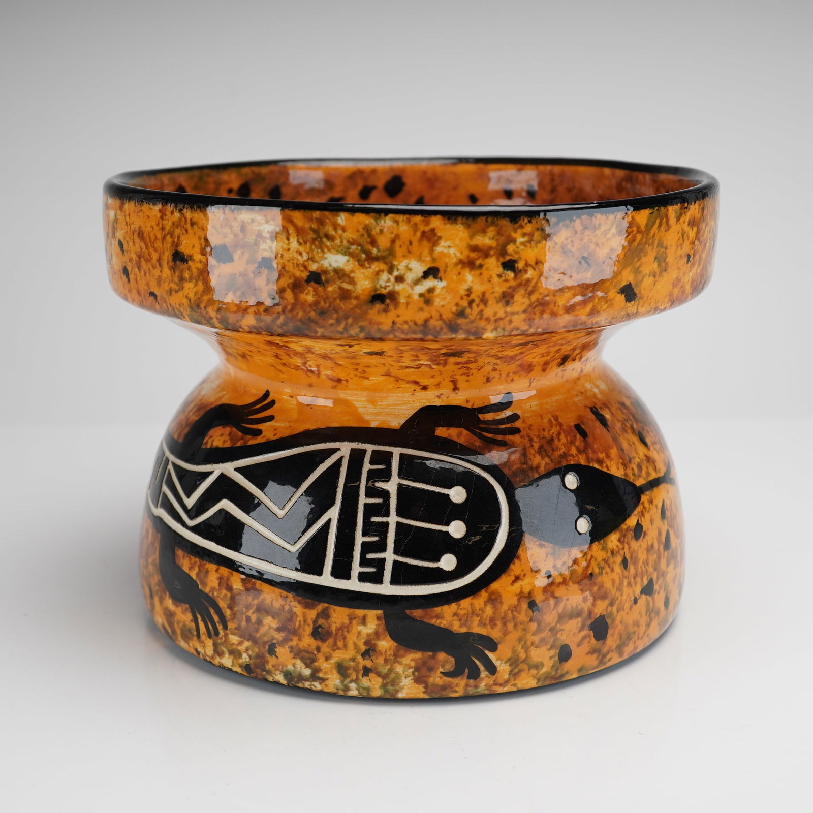 Mana Native American Pottery Vessel with Geometric Lizard Sgraffito: A single glazed ceramic vessel attributed to Mana Trujillo Native American Pottery Vase. The piece is of hourglass or spool form, featuring a wide mouth, constricted waist, and broad base. The earthen