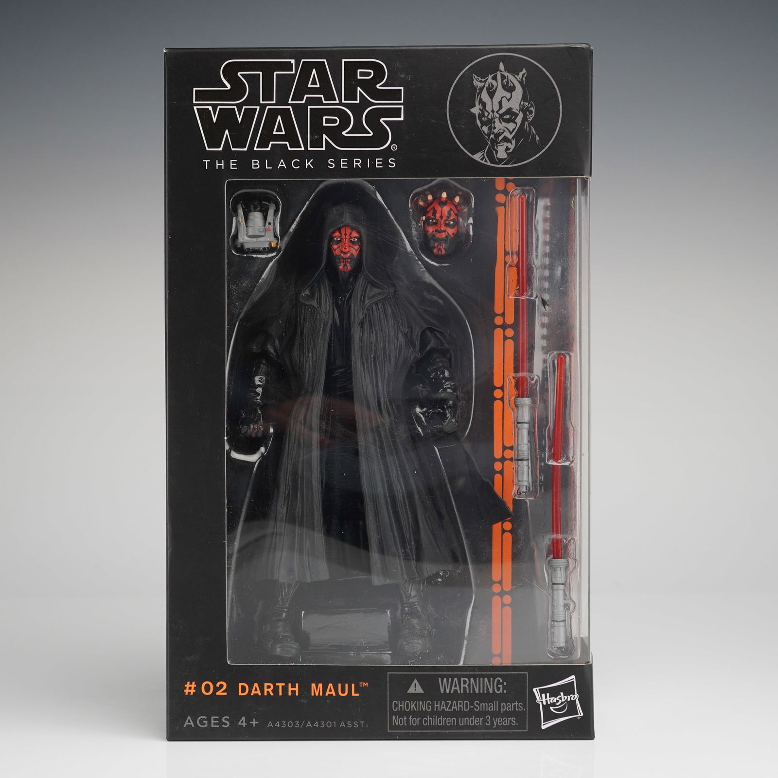 Star Wars The Black Series Darth Maul Action Figure: A packaged collectible Star Wars The Black Series 02 Darth Maul Figurine produced by Hasbro. This is the 6-inch scale action figure release, presented in a black box with a clear window, allowing visi