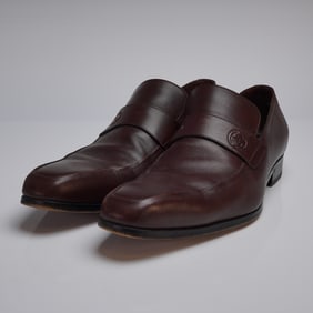 A Pair of Gucci Brown Leather GG Interlocking Loafers, Size 42E