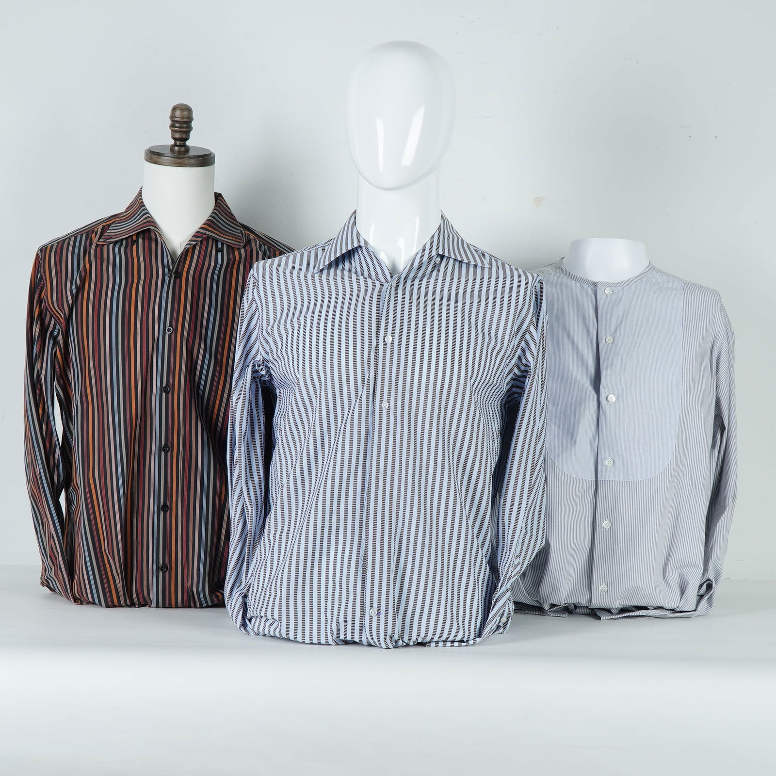 3pc Equilibrio & Dkny Men's Striped Shirts: Three striped, long sleeve button shirts , each designed with distinct color tones. Included is a multicolor vertical-stripe shirt by Equilibrio Milano in rich tones of red, orange, black, and grey; a