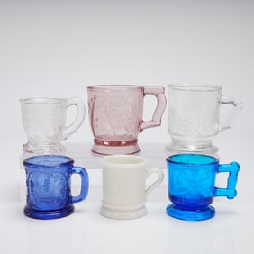 A Collection of Six American Pressed Glass Children's Miniature Mugs