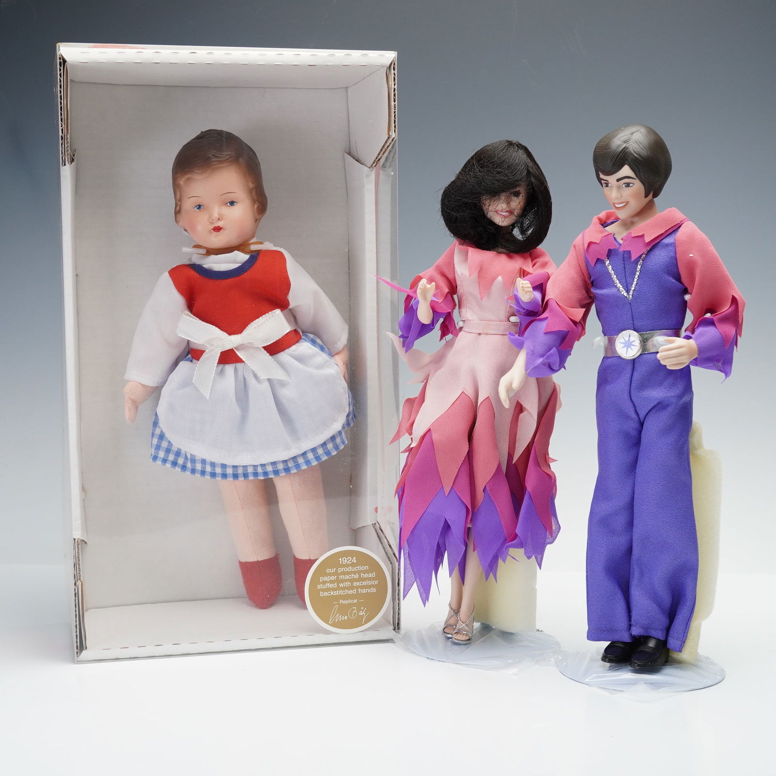 2pc Marie Osmond Donny & Marie Porcelain Dolls with Lissi Rosa Doll: This charming grouping features two limited edition collector doll sets, including Marie Osmond's "Through the Years" Donny & Marie porcelain dolls and a Lissi "Rosa" doll. The Donny & Marie dolls are