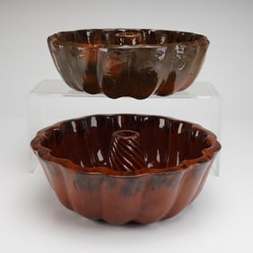 A Pair of Glazed Redware Turks Head Cake and Pudding Molds