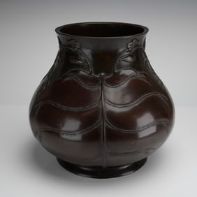 A Japanese Meiji Era Bronze Vase with Raised Foliate Decoration