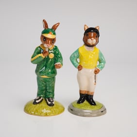 A Pair of Royal Doulton Bunnykins Stopwatch and Jockey Figurines