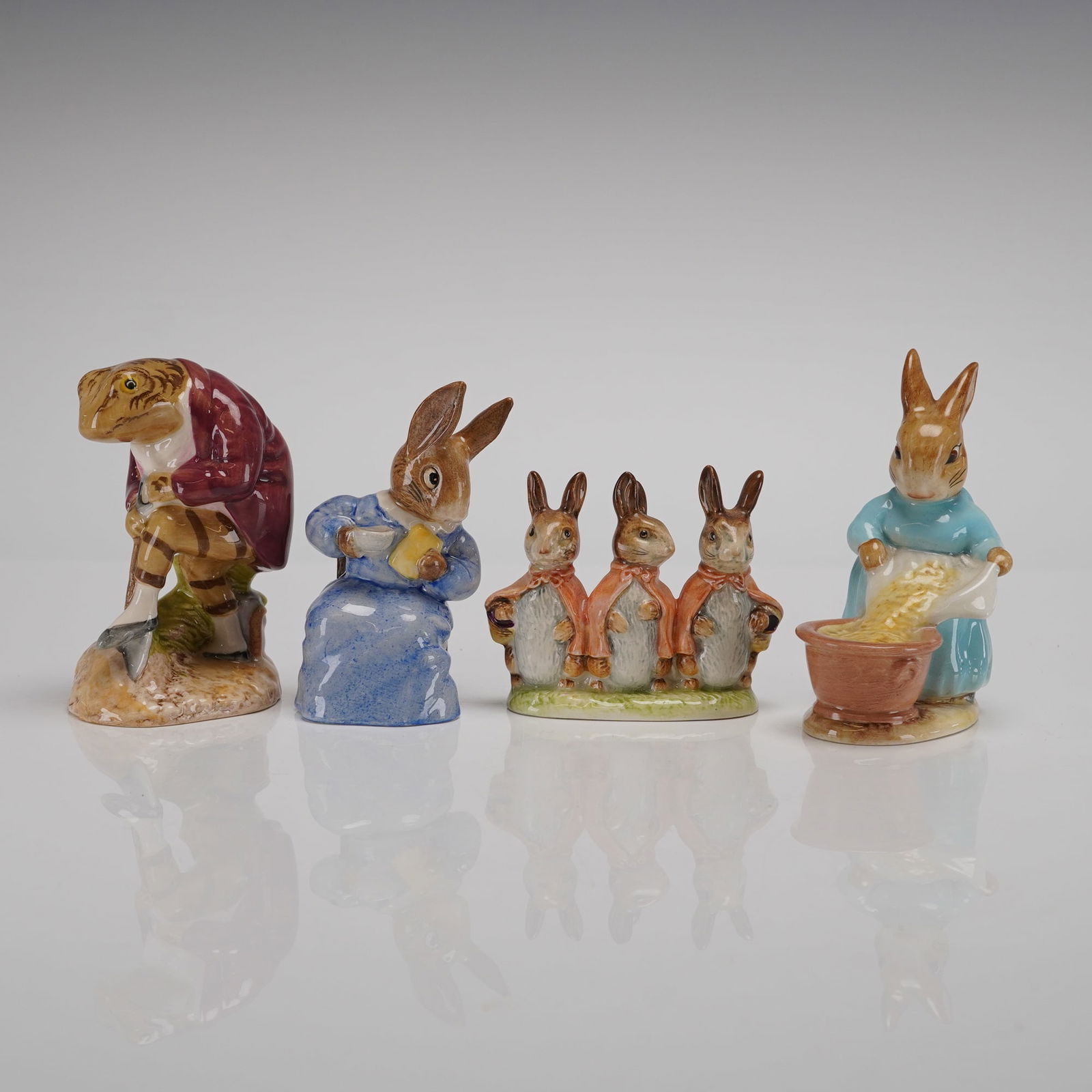 A Collection of Four Royal Albert and Beswick Beatrix Potter Figurines (1 of 4)