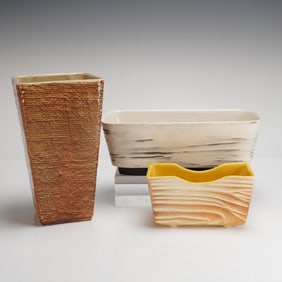 A Trio of Mid-Century Modern Shawnee Pottery Planters and Vase