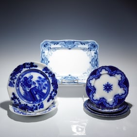 A Collection of Seven Piece Mixed Flow Blue Plates and Platter Lot