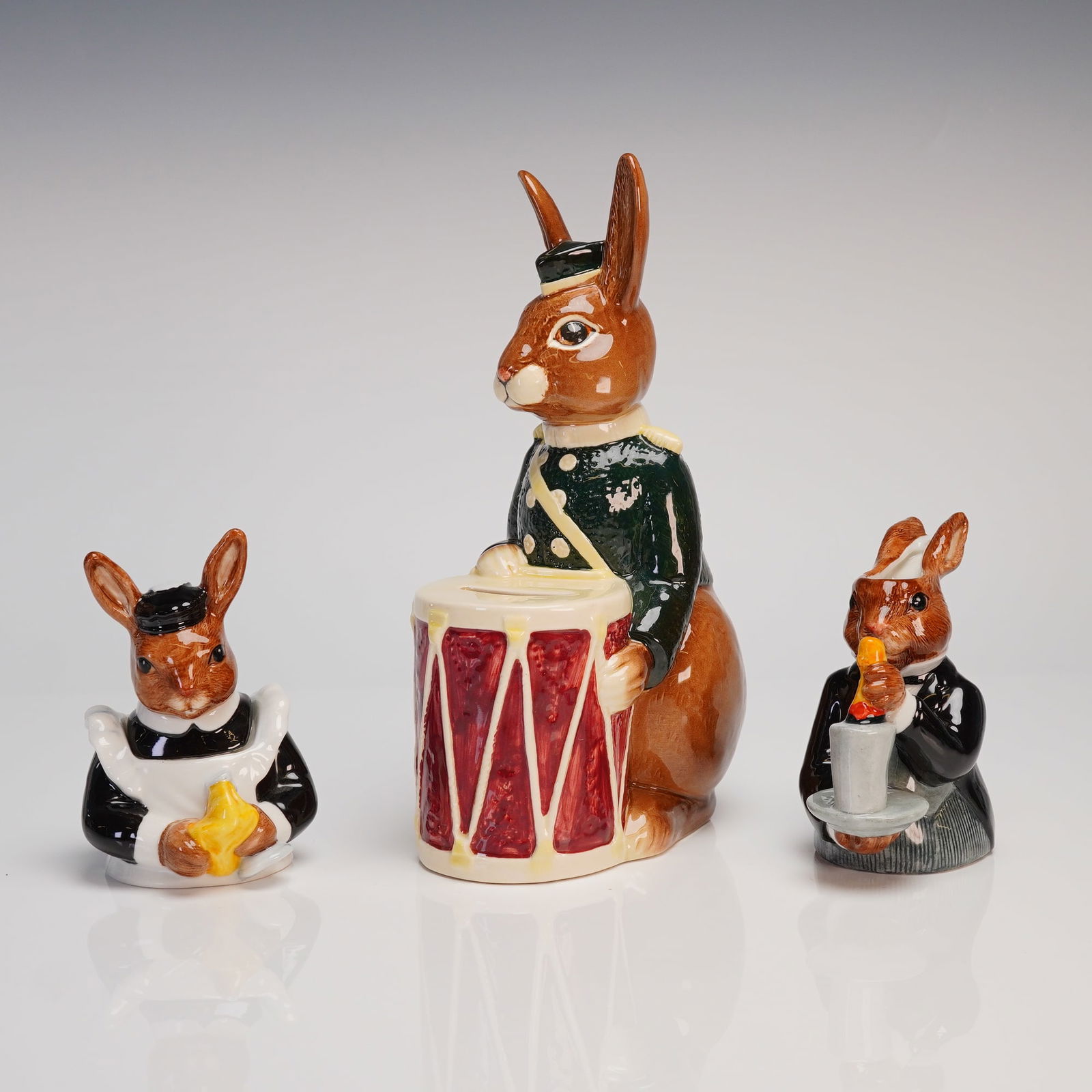 A Trio of Royal Doulton Bunnykins Porcelain Figurines and Bunnybank (1 of 3)