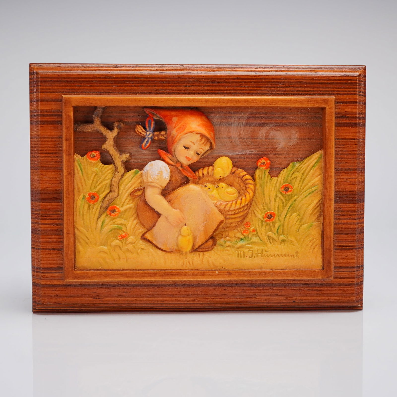 Goebel Hummel Four Seasons Chick Girl Music Box 2nd Edition: A commemorative wooden music box, identified as the Goebel M.J. Hummel The Four Seasons Series Second Edition "Chick Girl," presented with its original product box (2 items total). The music box is co