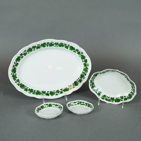 A Collection of Seven Meissen Full Green Vine Porcelain Serving Dishes
