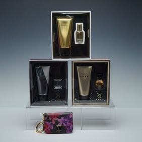 A Group of Victorias Secret Fragrance Gift Sets and Wallet