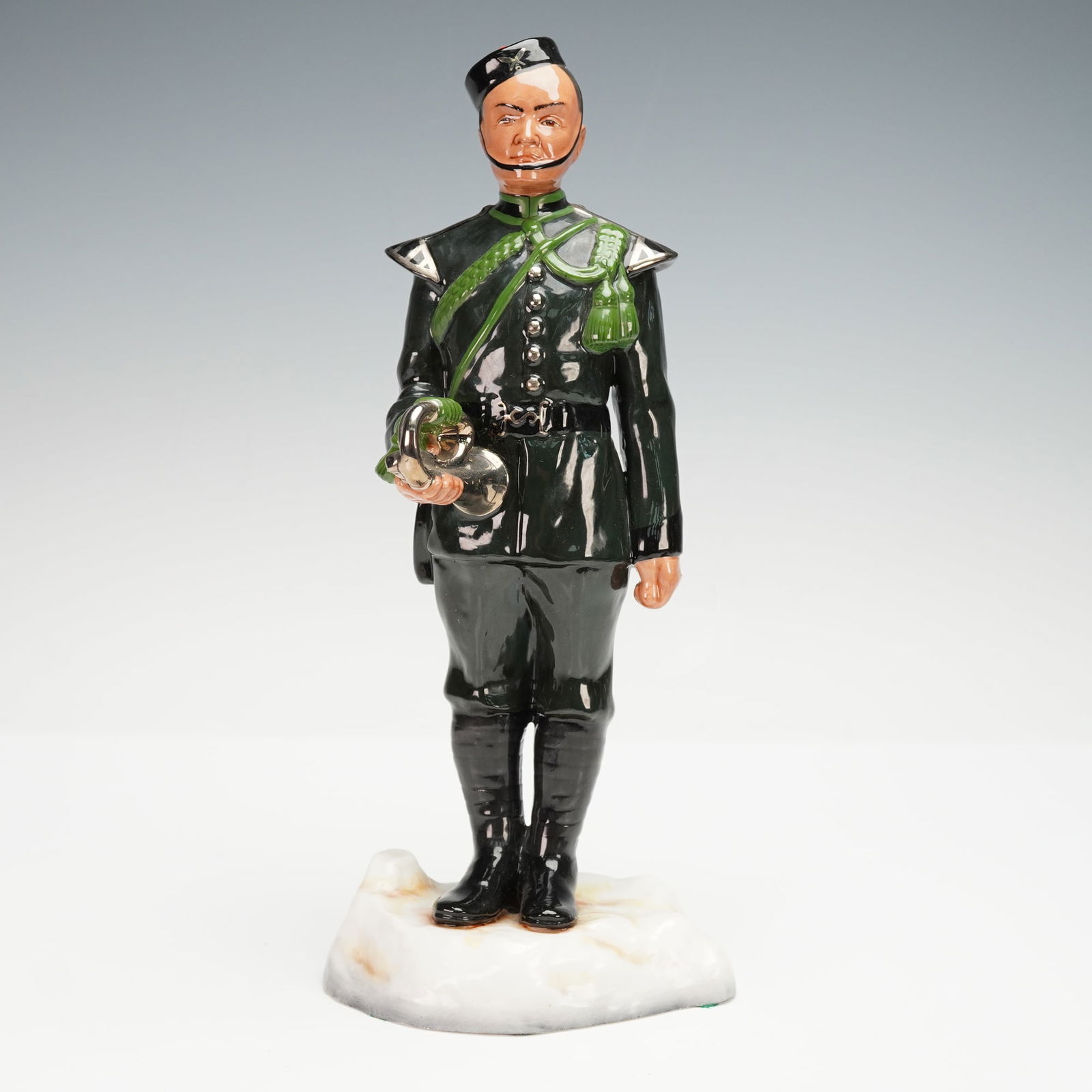 Michael Sutty Porcelain Figurine, 6th Gurkha Rifles, Bugler: This Michael Sutty porcelain figure depicts a bugler of the 6th Gurkha Rifles in full dress uniform, modelled and hand painted in England. It is marked as Model No. 90 and is part of a limited edition