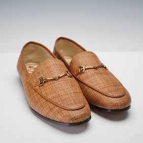 A Pair of Sam Edelman Loraine Brown Loafers