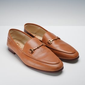 A Pair of Sam Edelman Loraine Bit Brown Leather Loafers