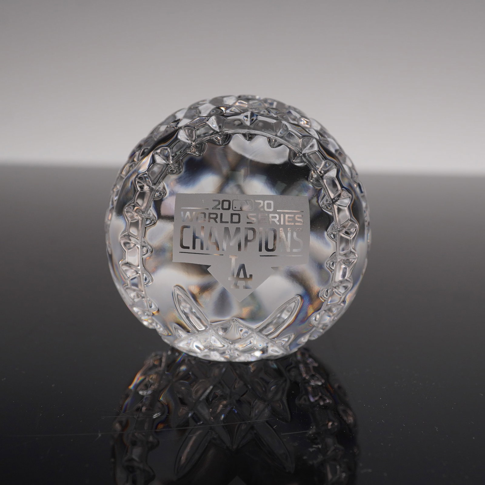Waterford Crystal Baseball, 2020 World Series Champions Los Angeles Dodgers: Waterford crystal baseball commemorating the Los Angeles Dodgers' 2020 World Series Championship. The sphere is deeply cut with realistic stitching detail and features an etched 2020 World Series Cham