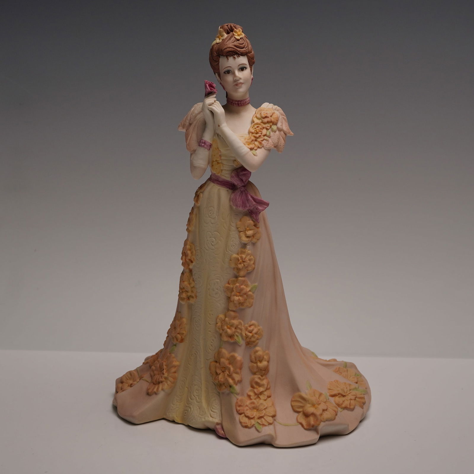 Coalport Age of Elegance Figurine of the Year 1997, Midsummer Dream: A Coalport porcelain figurine titled Midsummer Dream from the Age of Elegance series, named Figurine of the Year for 1997. Modelled by Jack Glynn and dated 1996, this hand-decorated figure features a