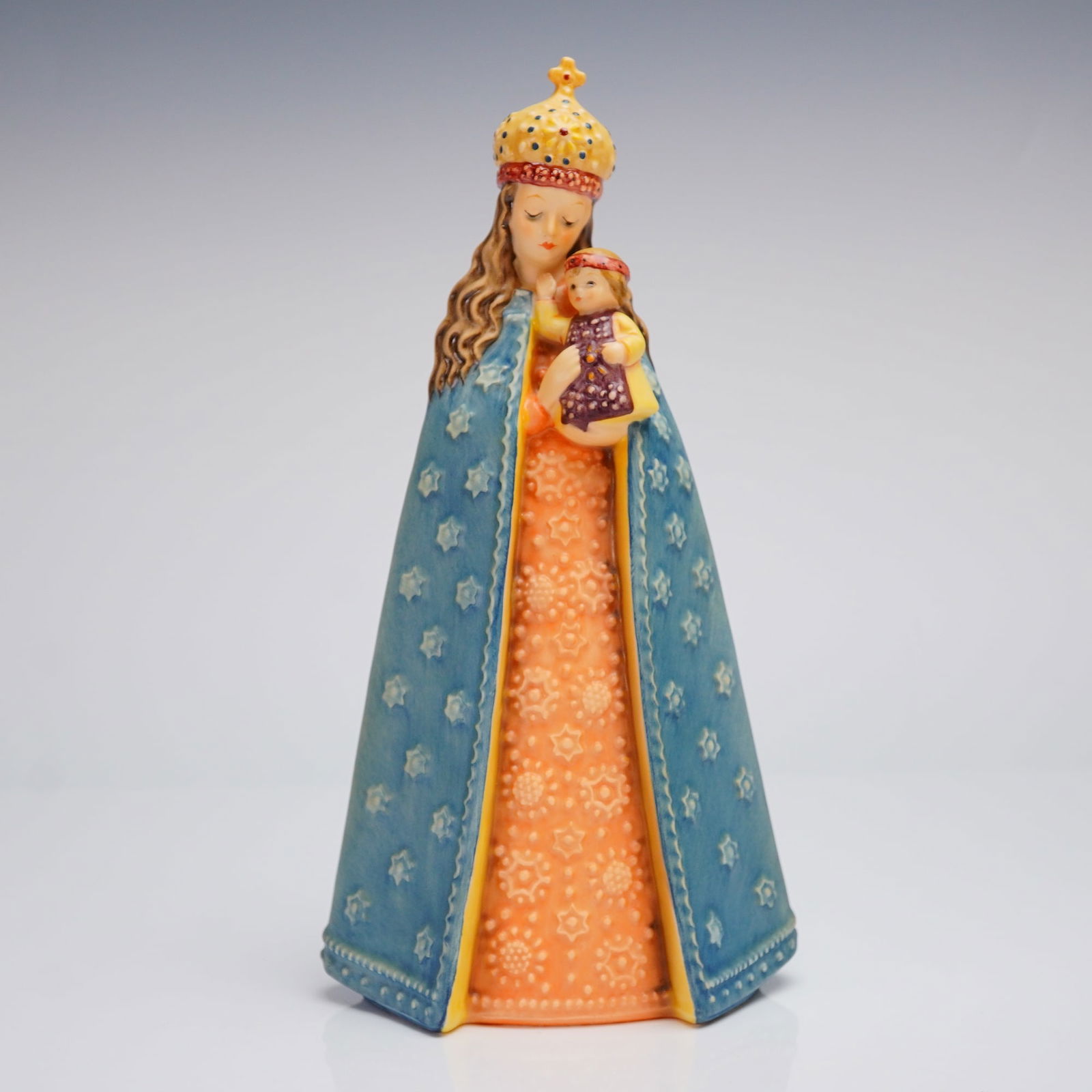 Goebel Hummel 75th Anniversary Celebration Figurine 364 with Original Box: A commemorative ceramic figurine produced by Goebel in celebration of the 75th Anniversary of the Birth of Sister Maria Innocentia Hummel (1909-1984). The lot includes the figurine, model number 364,