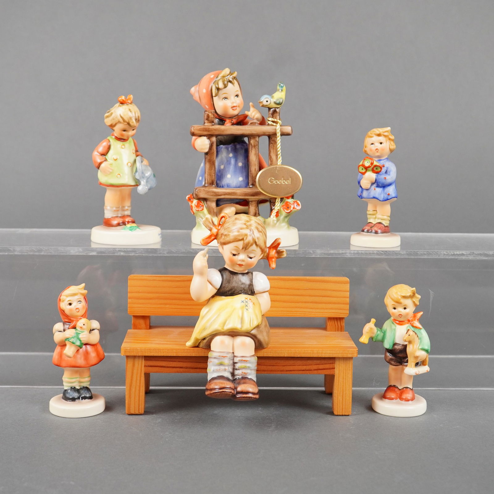 7pc Goebel Hummel Figurines and Accessory Bench (1 of 3)