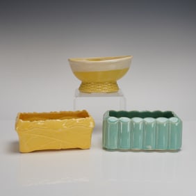 Three McCoy Pottery Planters and Footed Oval Container