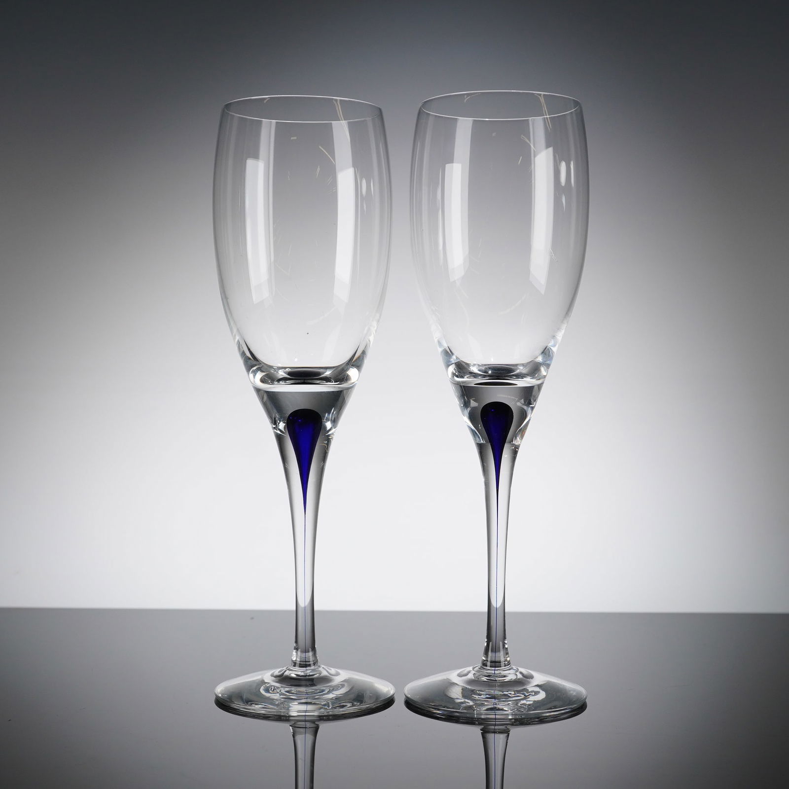 A Pair of Orrefors Intermezzo Blue Crystal Flutes (1 of 4)