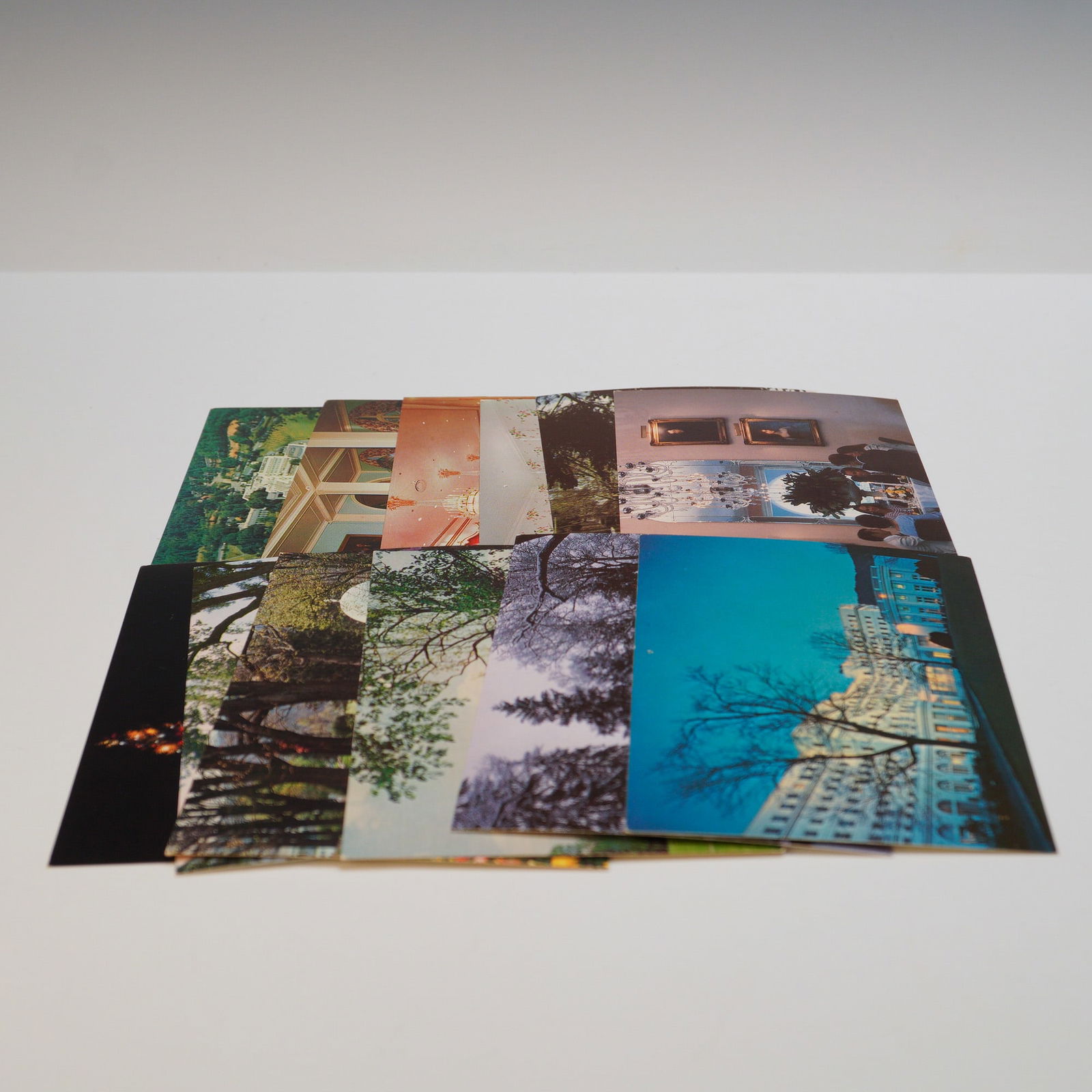 12pc Vintage Postcards, The Greenbrier Resort West Virginia: Set of 12 vintage postcards depicting The Greenbrier Resort in White Sulphur Springs, West Virginia. Images show both interior and exterior views of the historic luxury hotel, including its grand arch