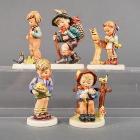 A Collection of Five Goebel M. I. Hummel Figurines Including Flower Vendor