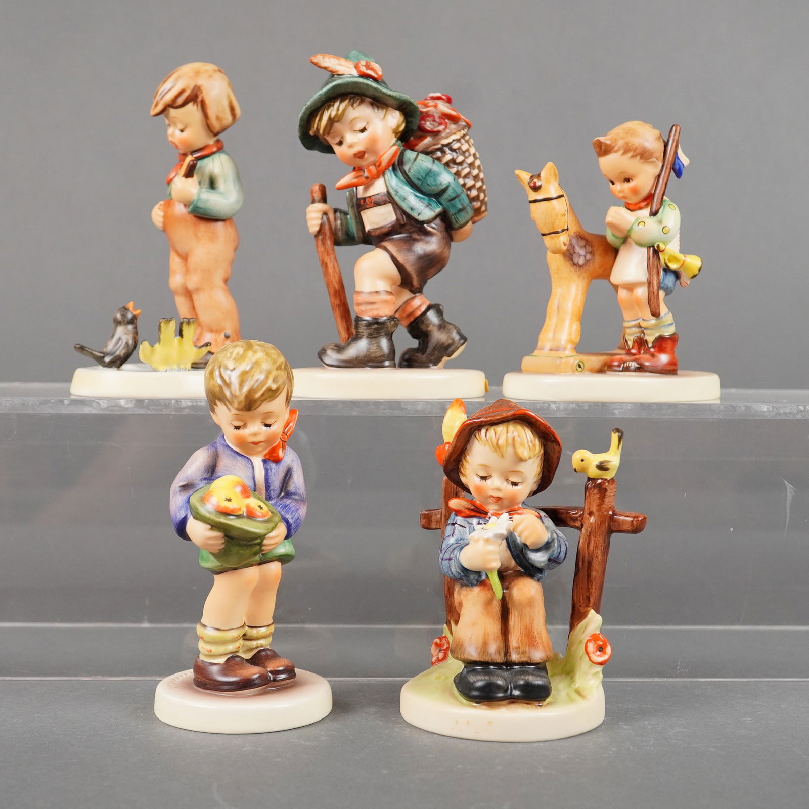 A Collection of Five Goebel M. I. Hummel Figurines Including Flower Vendor (1 of 3)
