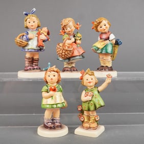A Collection of Five Goebel M.I. Hummel Ceramic Figurines