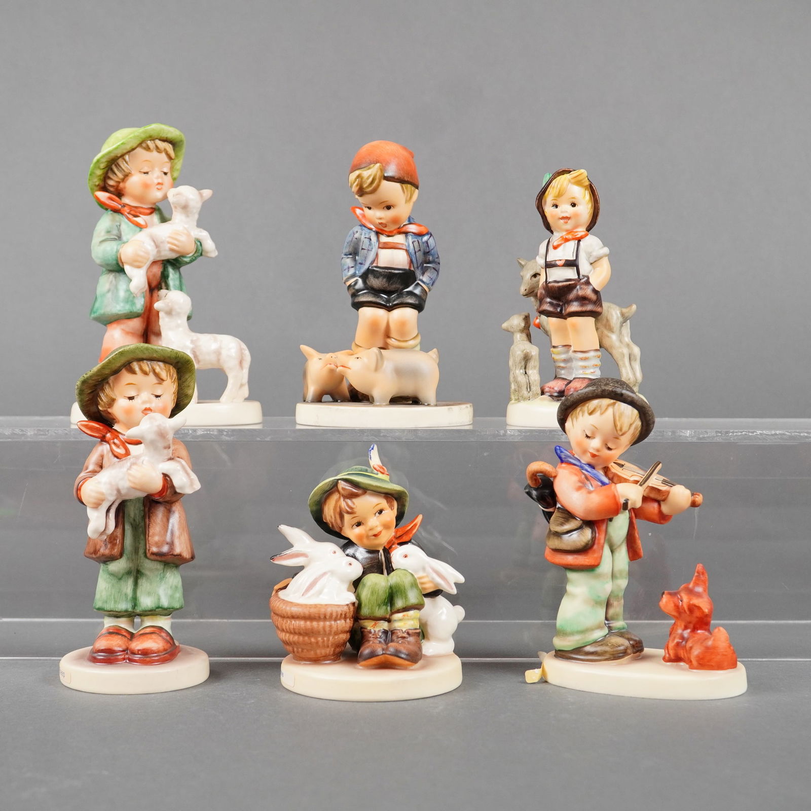 A Collection of Six Goebel Hummel Figurines (1 of 3)
